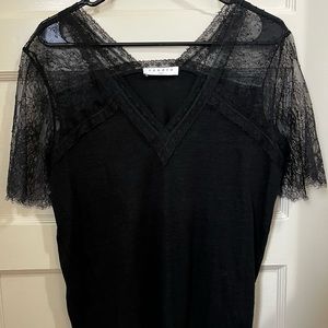 Black shirt with short laces sleeves from Sandro in size 3.